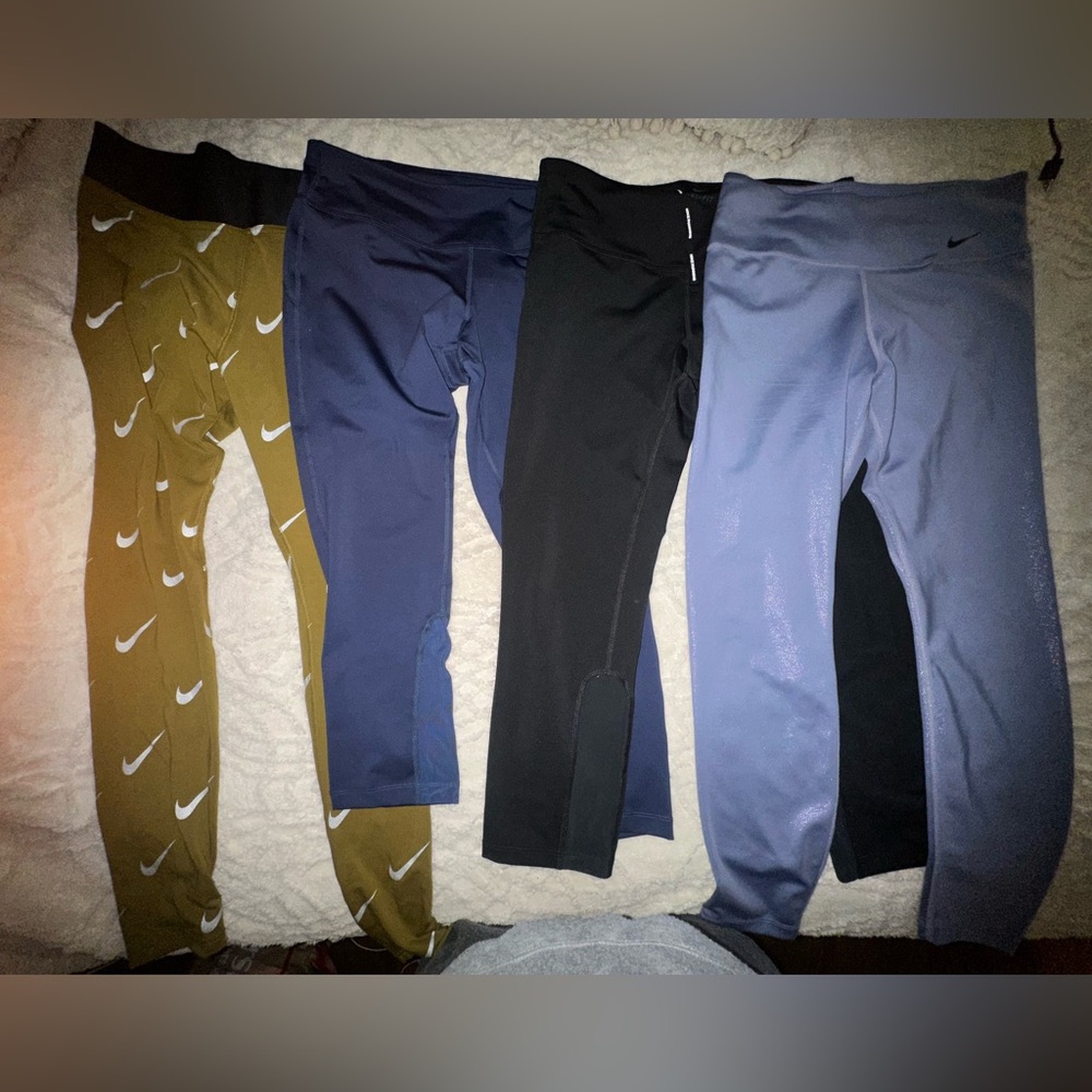 4 pair of Nike Women's Leggings size M
